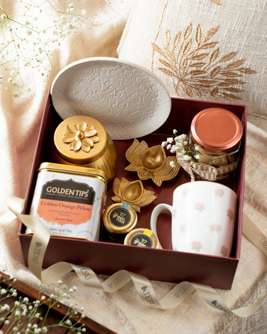 The classic deep maroon coloured&nbsp; boxes engraved with auspicious golden lotus flowers makes it elegant at the same time festive. Its a delightful collection of India inspired socially conscious products , designed to last and influenced by the culture and traditions we grew up in and definitely made to bring Joys.
