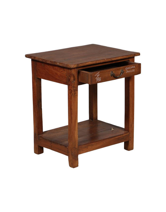 Wooden side table with a drawer on a white background