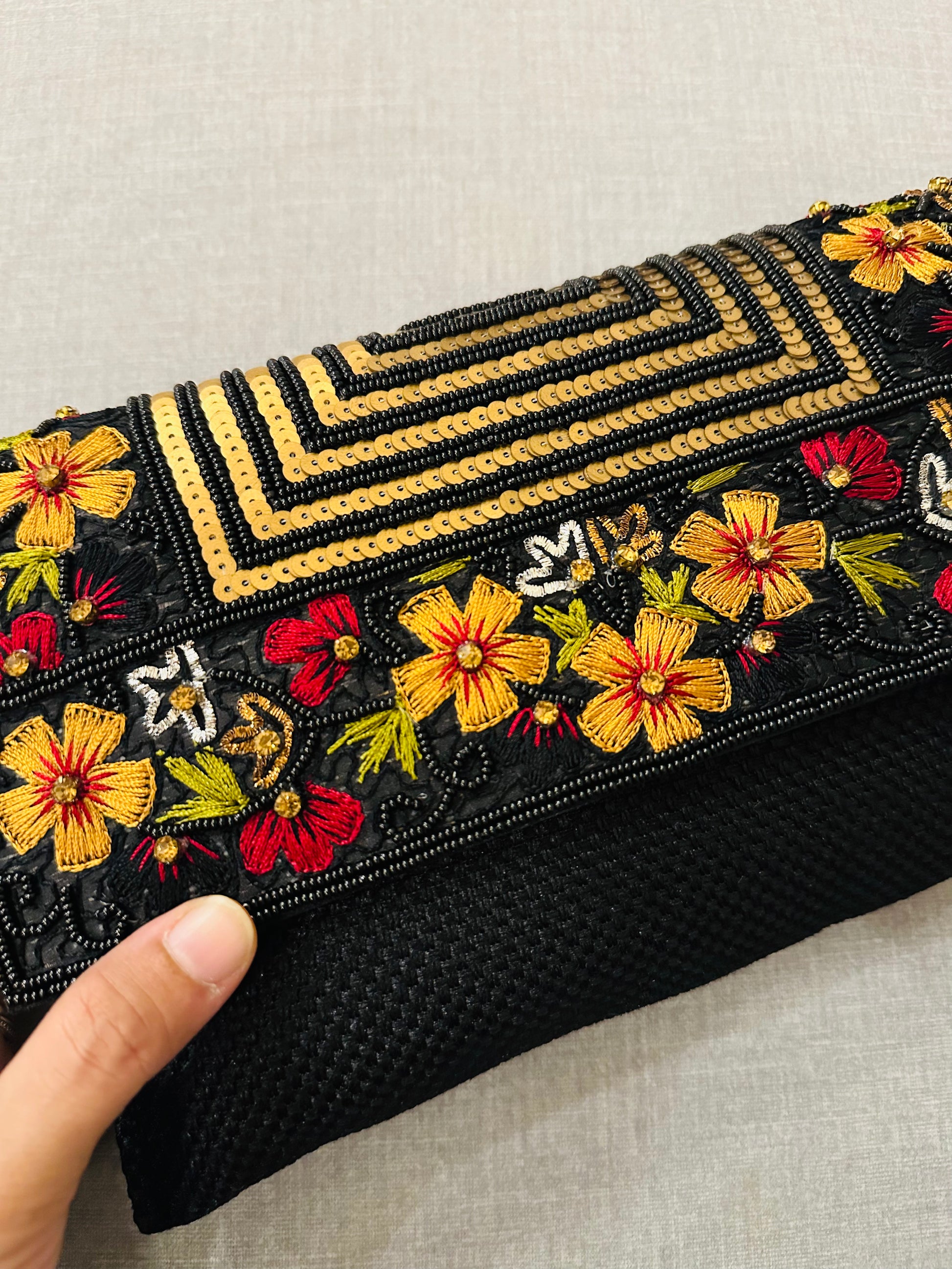 Handcrafted jute clutch with gold zardozi embroidery, magnetic closure, traditional Indian Bhopali Batua design