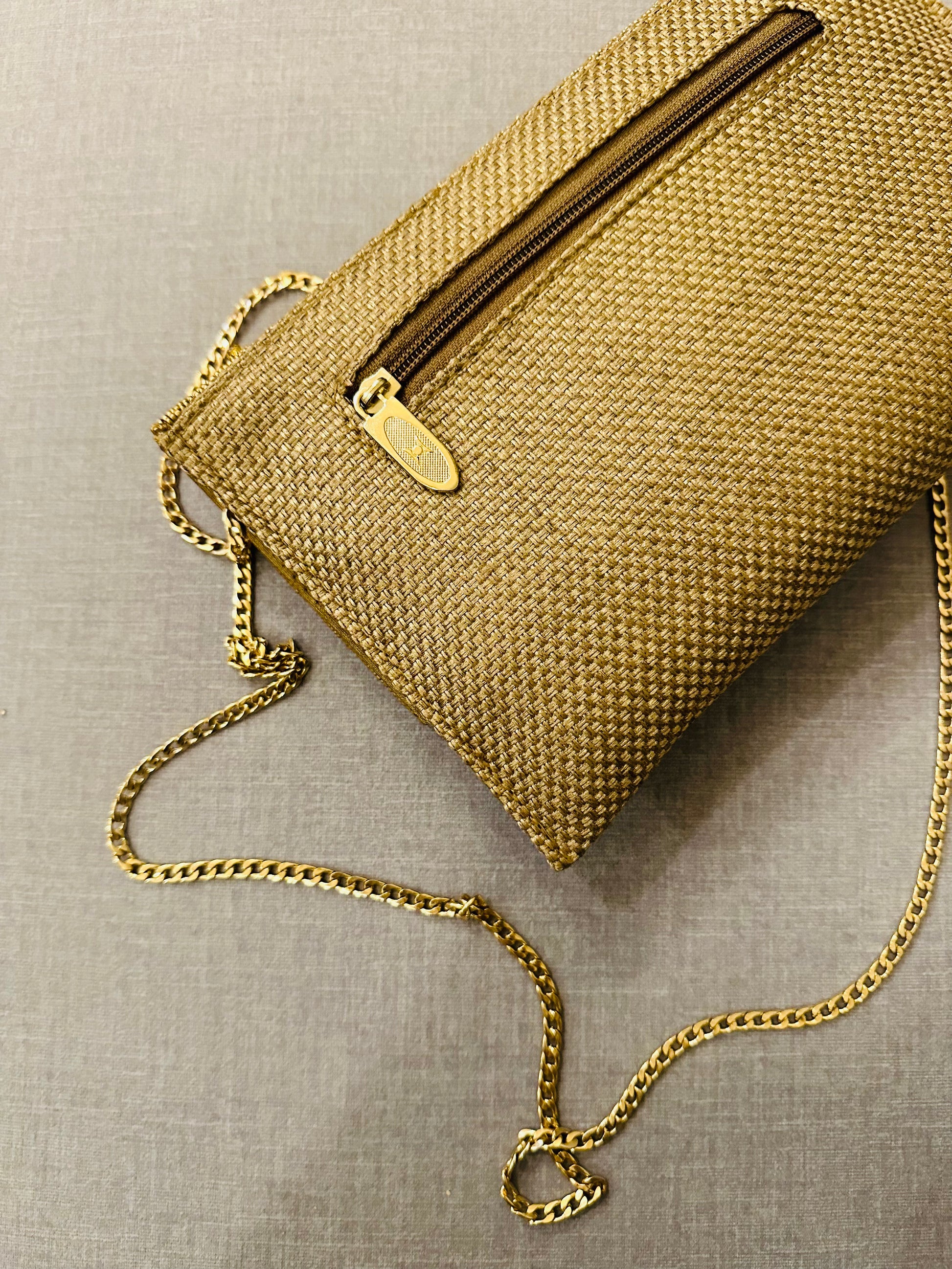 Side profile of handcrafted clutch showing 6x9.5 inch dimensions and traditional embroidery craftsmanship