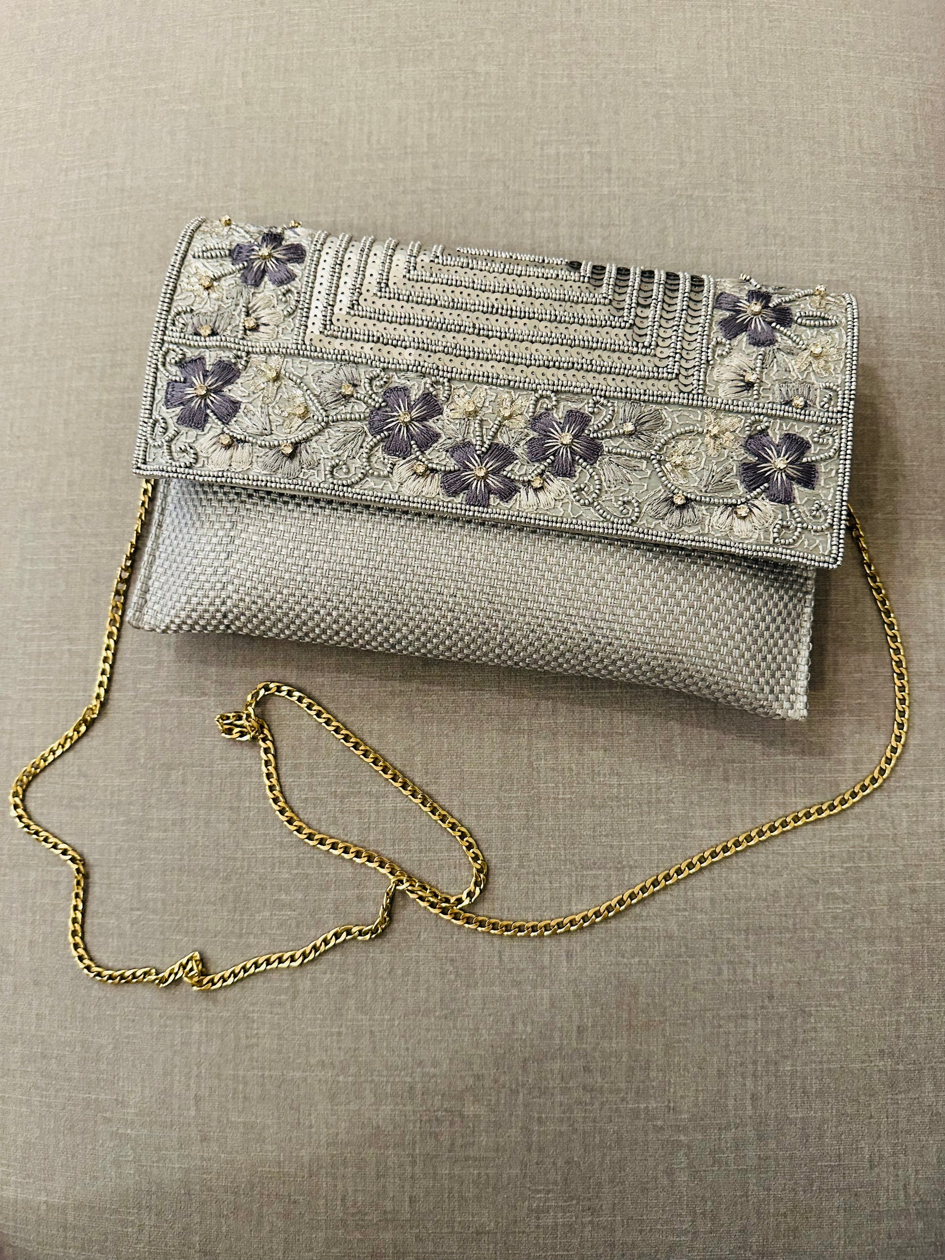 Handcrafted jute clutch with gold zardozi embroidery, magnetic closure, traditional Indian Bhopali Batua design