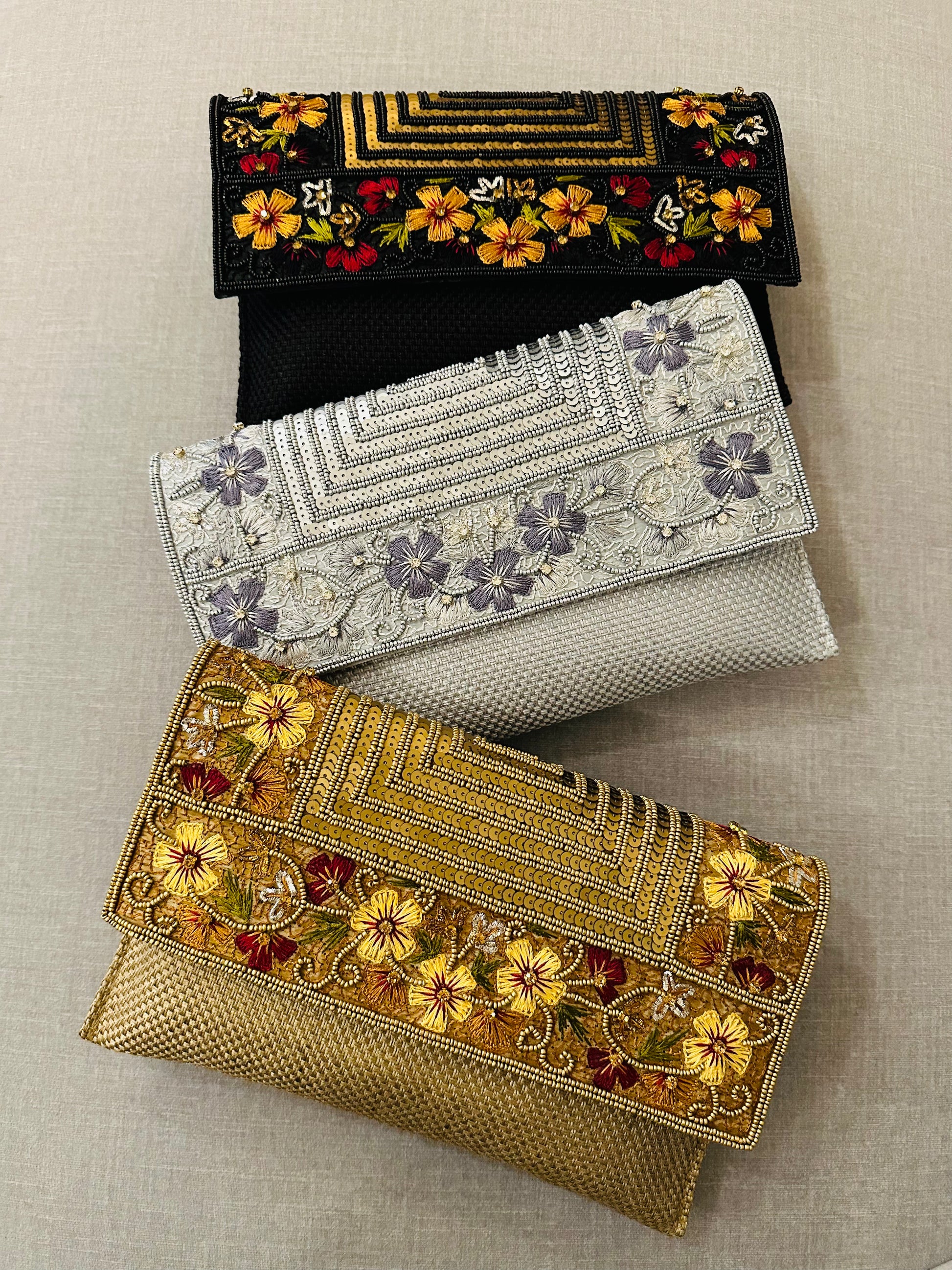Handcrafted jute clutch with gold zardozi embroidery, magnetic closure, traditional Indian Bhopali Batua design
