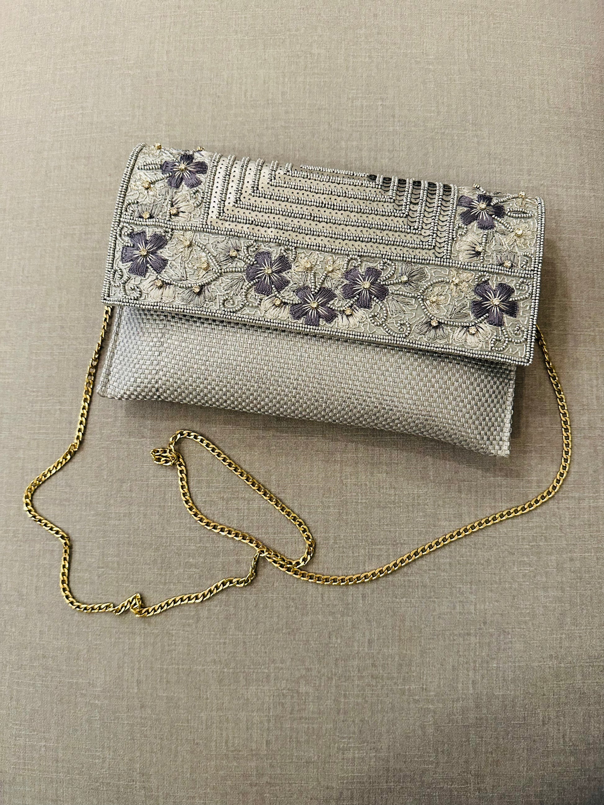 Handcrafted jute clutch with gold zardozi embroidery, magnetic closure, traditional Indian Bhopali Batua design