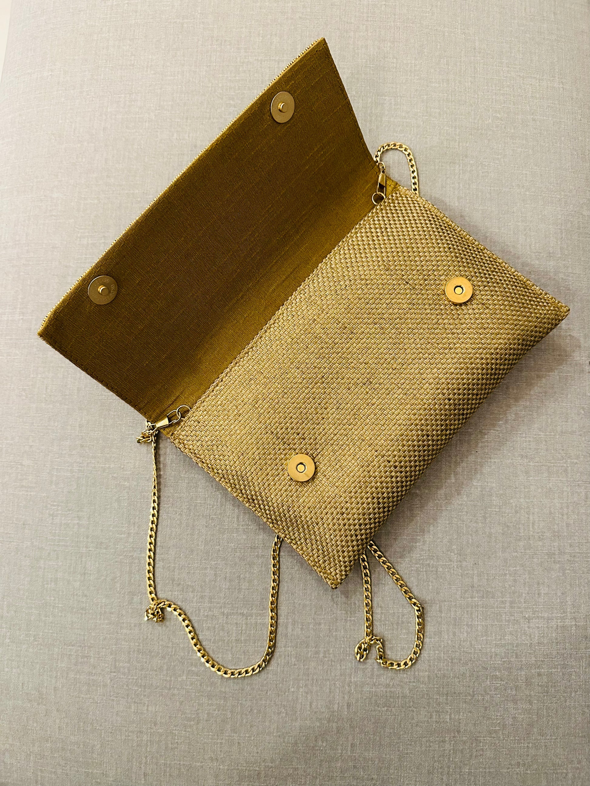 Handcrafted jute clutch with gold zardozi embroidery, magnetic closure, traditional Indian Bhopali Batua design