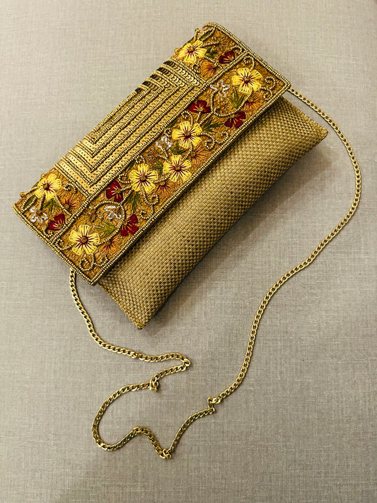 Handcrafted jute clutch with gold zardozi embroidery, magnetic closure, traditional Indian Bhopali Batua design