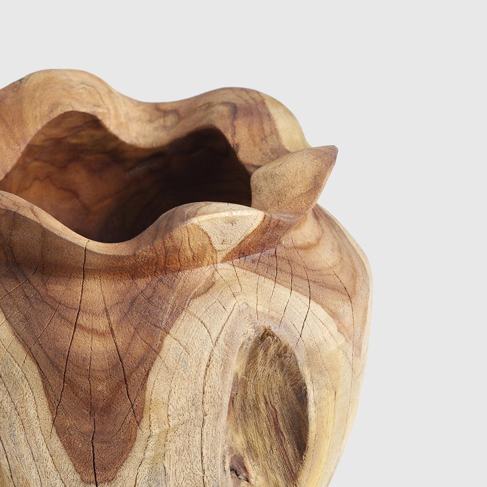 Heart Vase is a combination of love and art, made of teak wood it's a piece carved from nature itself