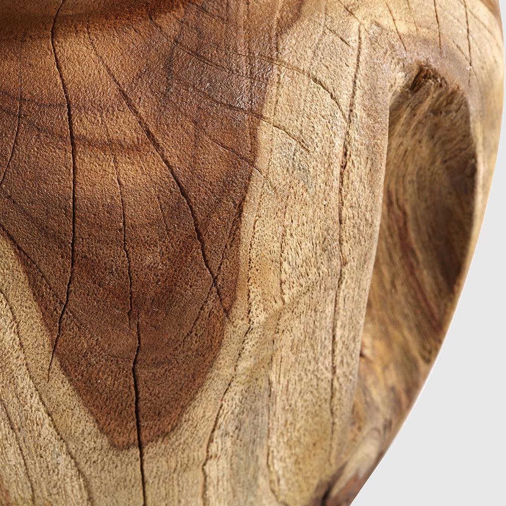 Heart Vase is a beautiful fusion of love and art, carved from natural teak wood. Its unique design captures the essence of nature, showcasing the intricate grain and warmth of the wood.