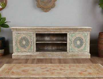 Bring home a regal touch of heritage with the Royal Mandala Plasma Stand, exquisitely handcrafted from solid mango wood.