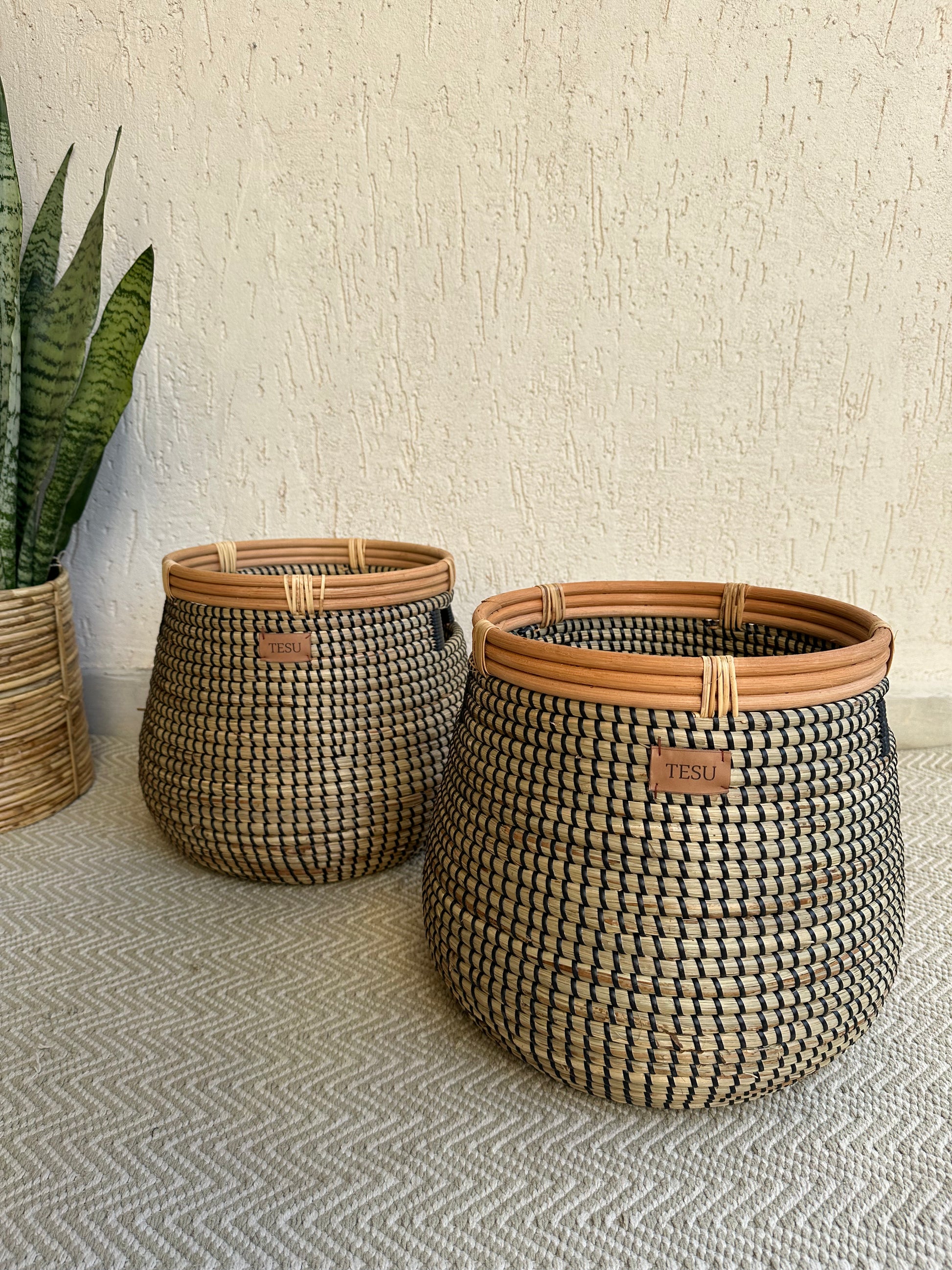 Handwoven seagrass plant holder basket in natural color, sustainable storage for plants and home organization