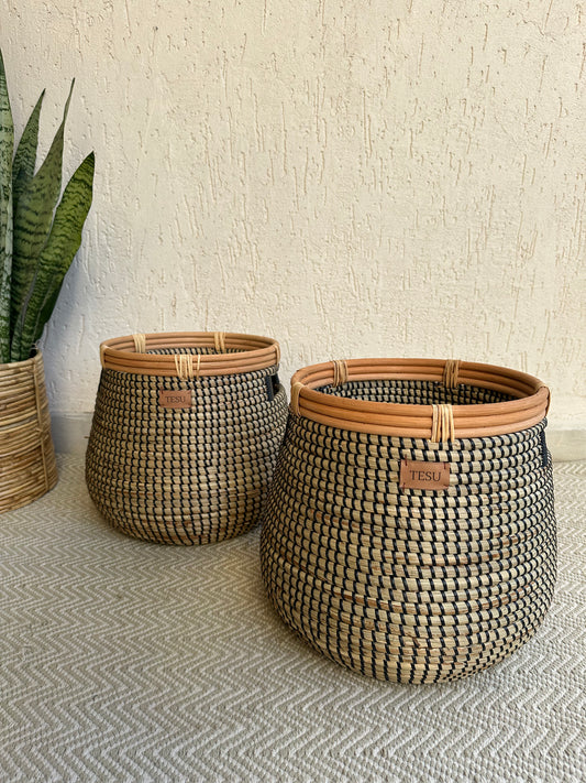 Handwoven seagrass plant holder basket in natural color, sustainable storage for plants and home organization