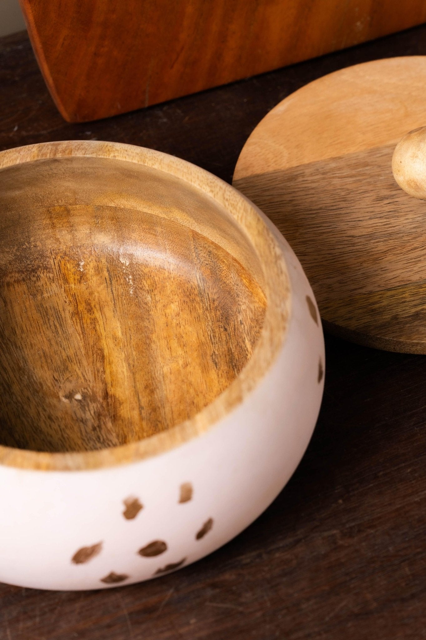 Close-up of handpainted wooden roti box showing pink decorative finish and premium wood construction