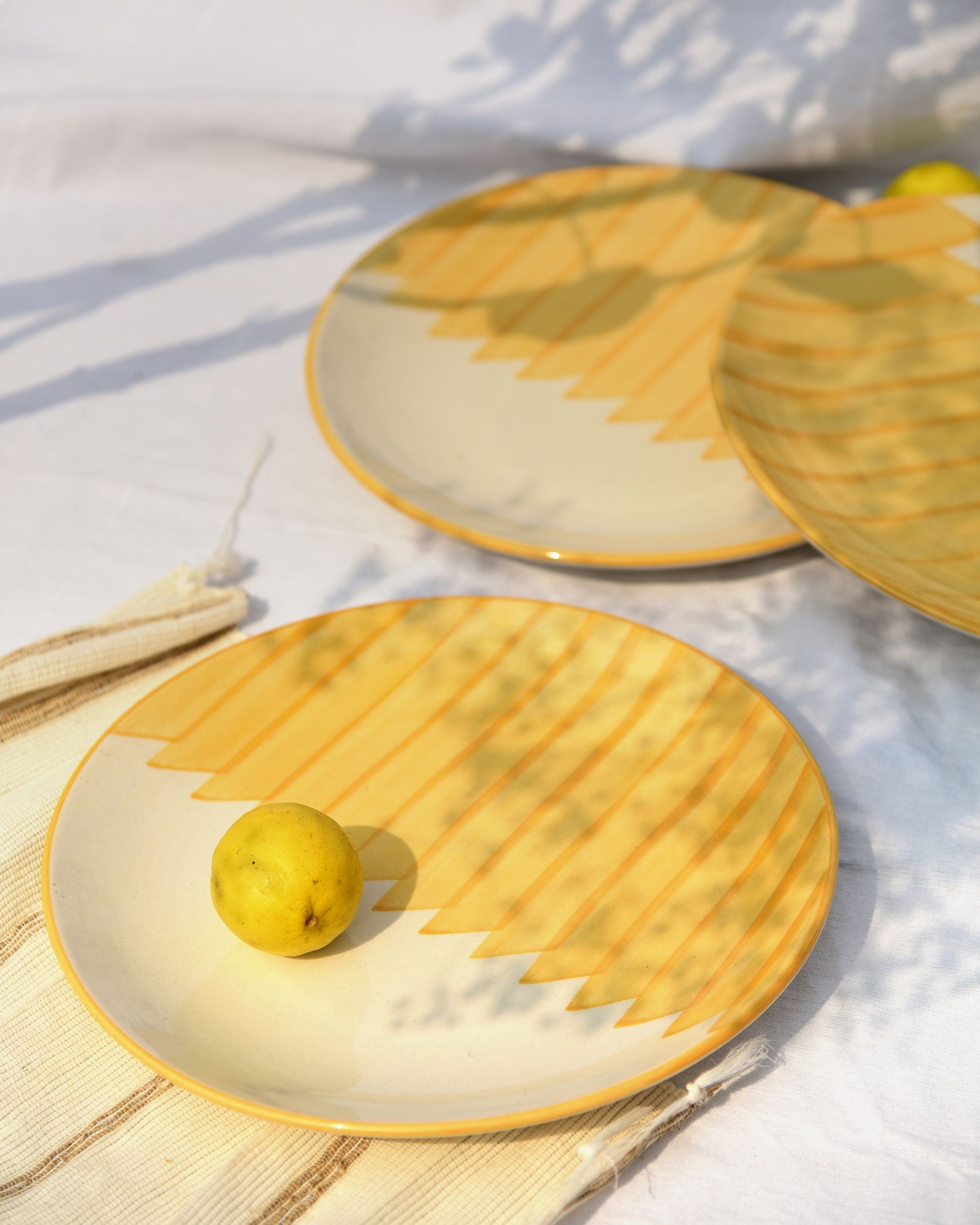  Bright yellow prints, Cheerful table setting, Durable plate set, Handcrafted plate set, Hand-painted plate set, High-quality plate set, Large dinner plate, Mesmerizing meal plate set, Positano hand-painted plate set, Radial design plate, Small batch plate set, Stylish plate set, Sunny outdoor brunch plate set, Vibrant plate set, Yellow plate set, tesu