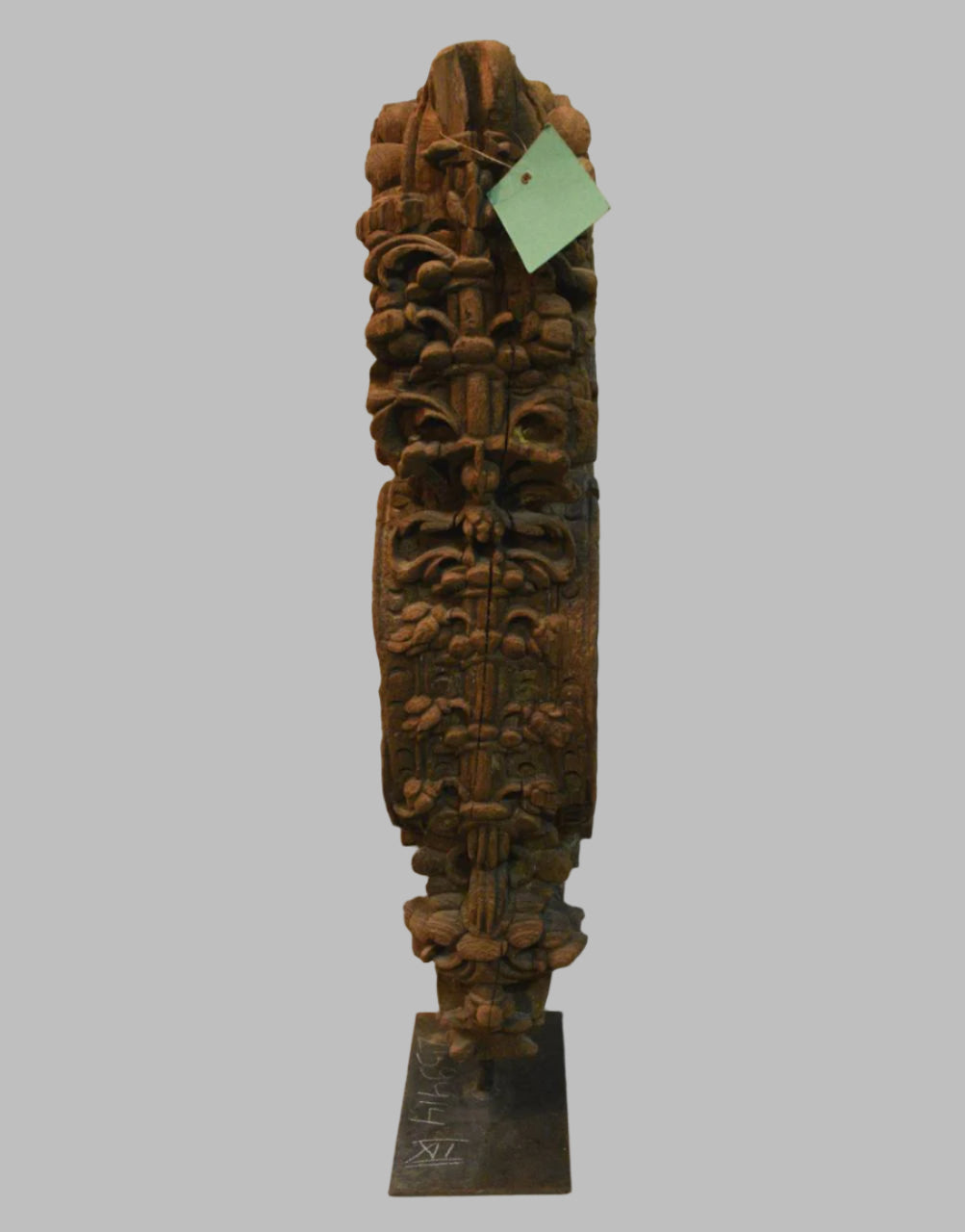 Carved wooden sculpture on a white background