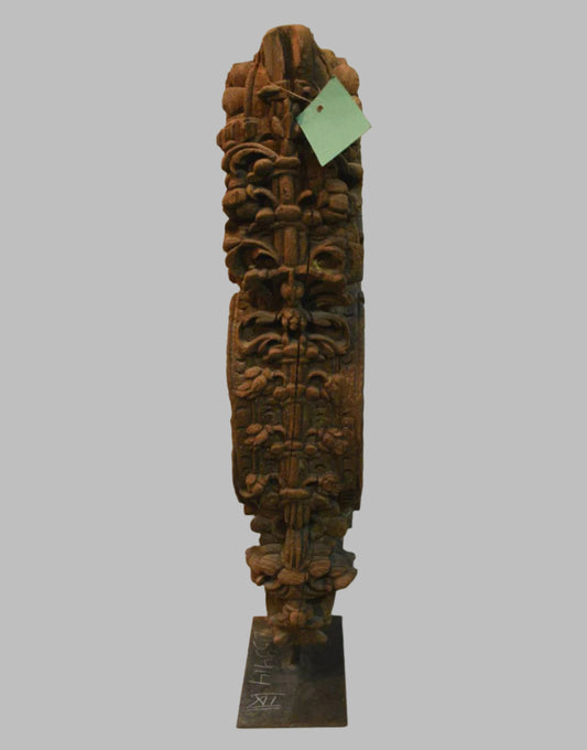 Carved wooden sculpture on a white background