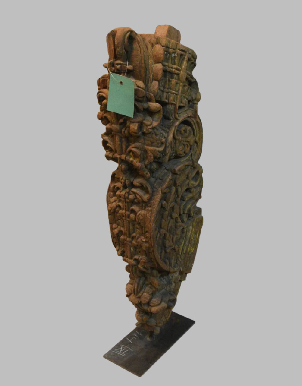 Carved wooden sculpture on a white background