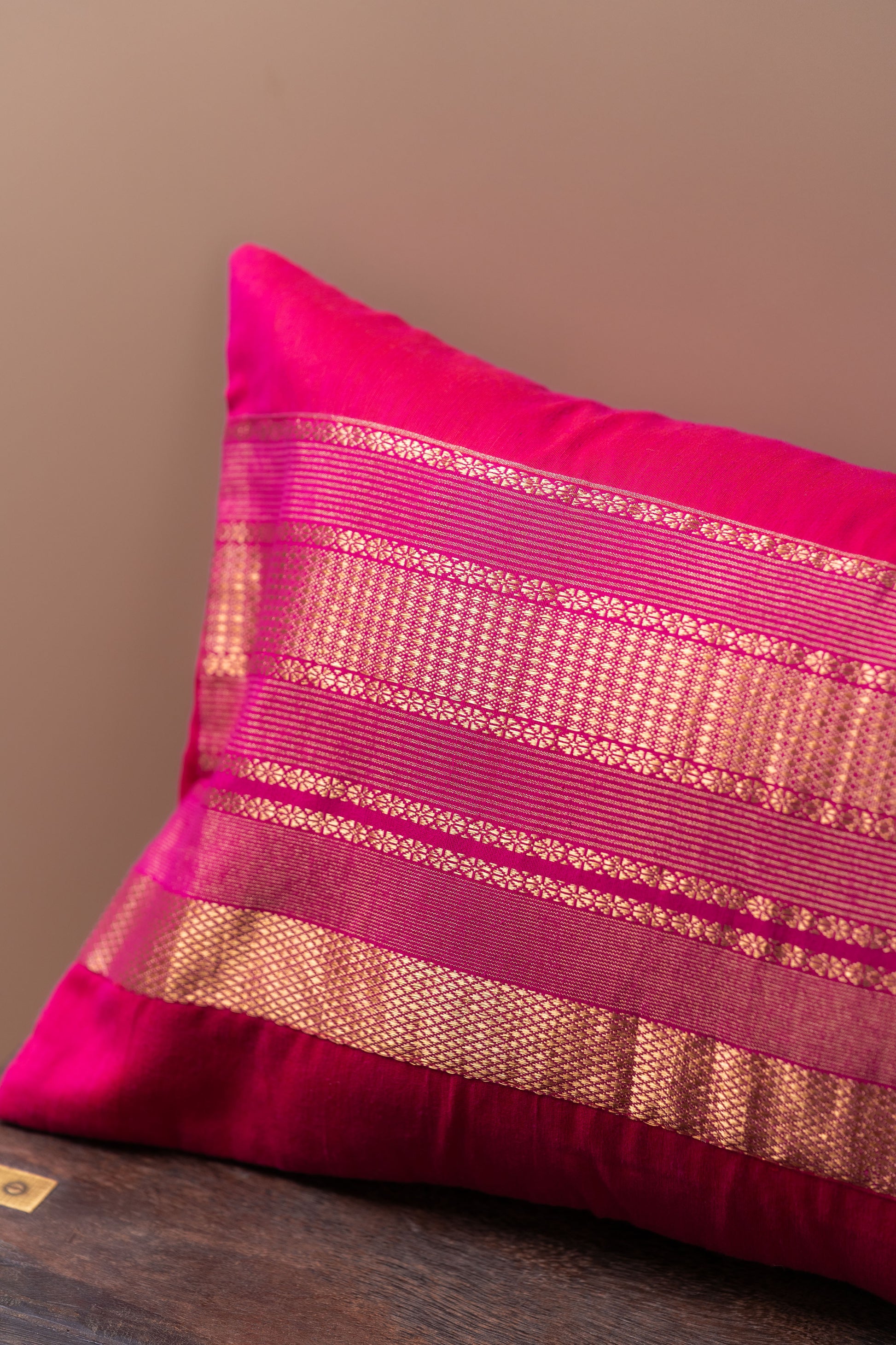 Magenta and gold lumbar cushion cover
Luxurious lumbar pillow
Sophisticated home decor
Broad border cushion cover
Rich magenta fabric
Elegant golden border
Statement piece for sofa
High-quality cushion cover
Comfortable lumbar support
Vibrant colors decor
Chic design cushion
Modern and traditional interiors
Elevate home aesthetics
Stylish accent chair cushion
Decorative lumbar pillow