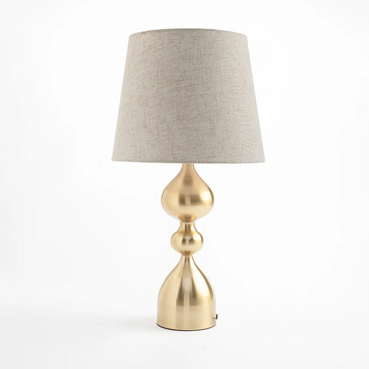 Perfectly balancing modern design and timeless style, this lamp creates a warm, inviting glow ideal for any bedroom, living room, or study space.