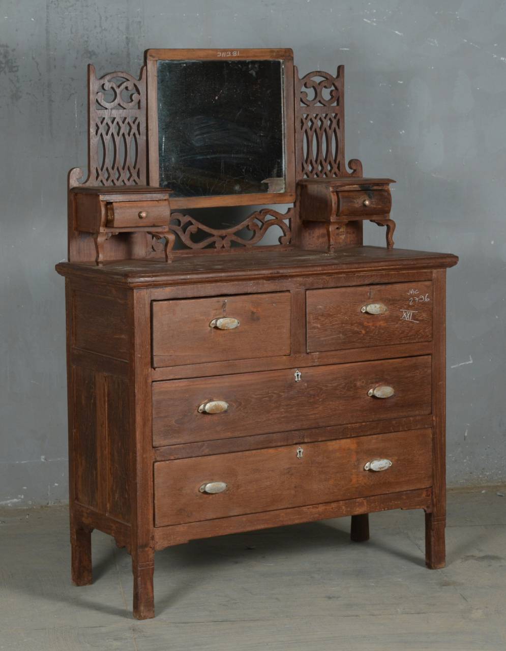 Wooden vanity with mirror on a gray background