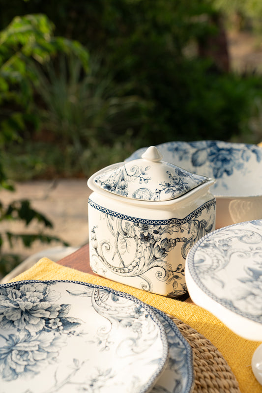 Arezzo collection Tuscany-inspired living Countryside dining inspiration Alfresco dining lifestyle Bird, tree, flower motifs Sophisticated storage solutions White jar with blue flower prints Durable porcelain jar Pantry organization Fresh pantry storage Vibrant blue floral pattern Timeless kitchenware Stylish kitchen storage Practical kitchen accessory, tesu