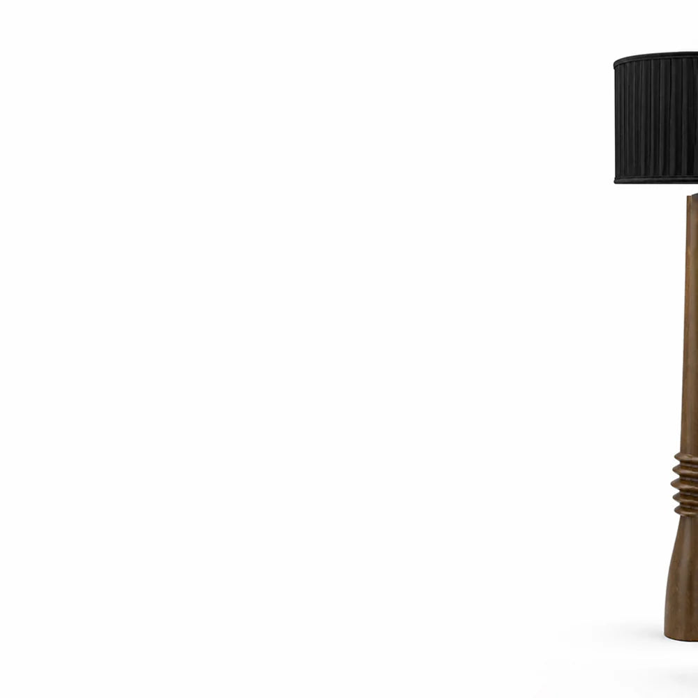 Floor lamp with a black shade on a white background