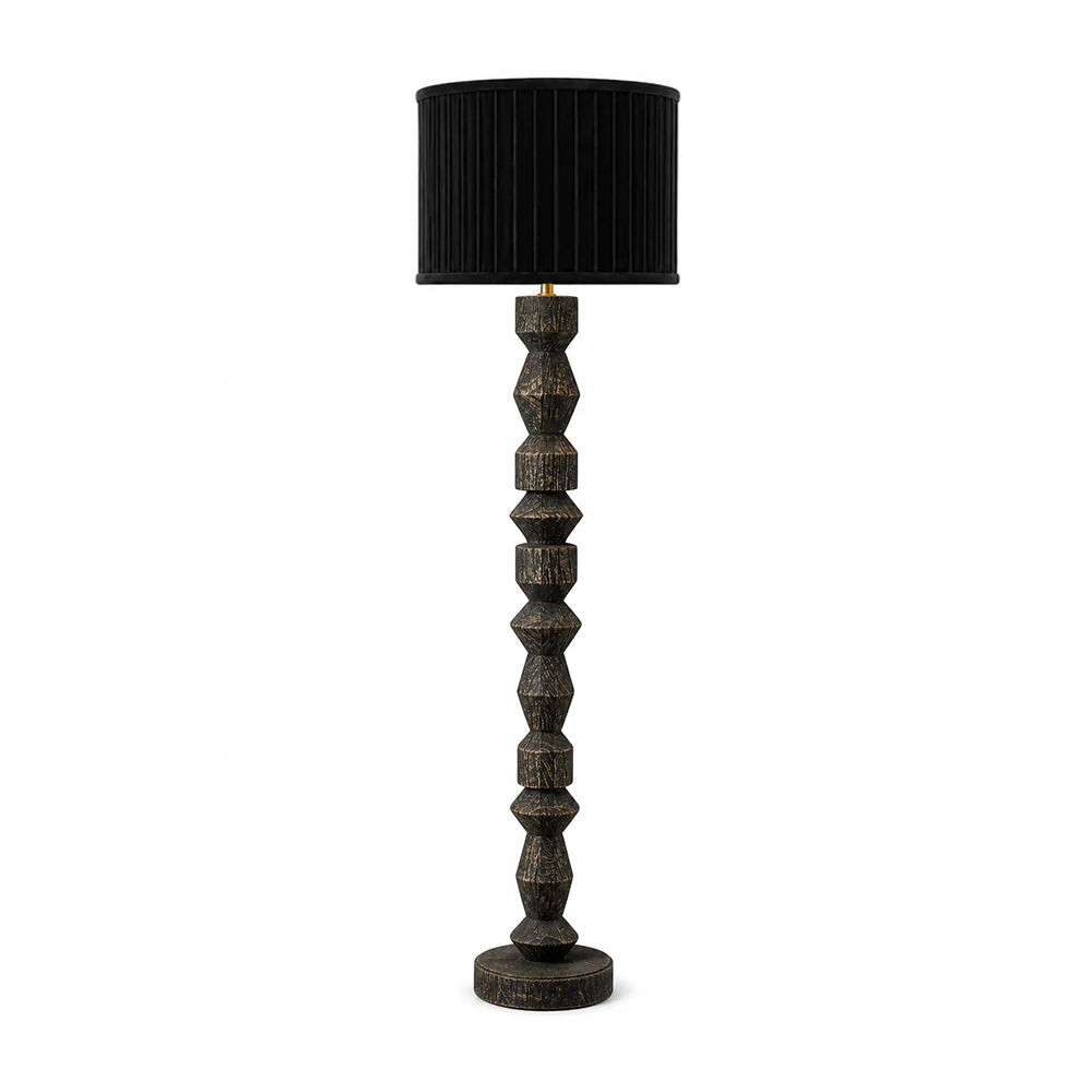 Decorative floor lamp with a black lampshade on a white background