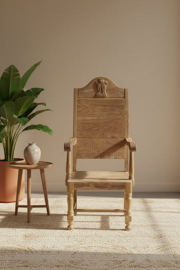 Wooden chair with armrests on a green floor
