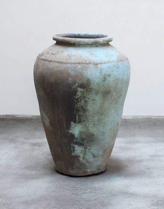 Vintage terracotta pot with a patina finish 