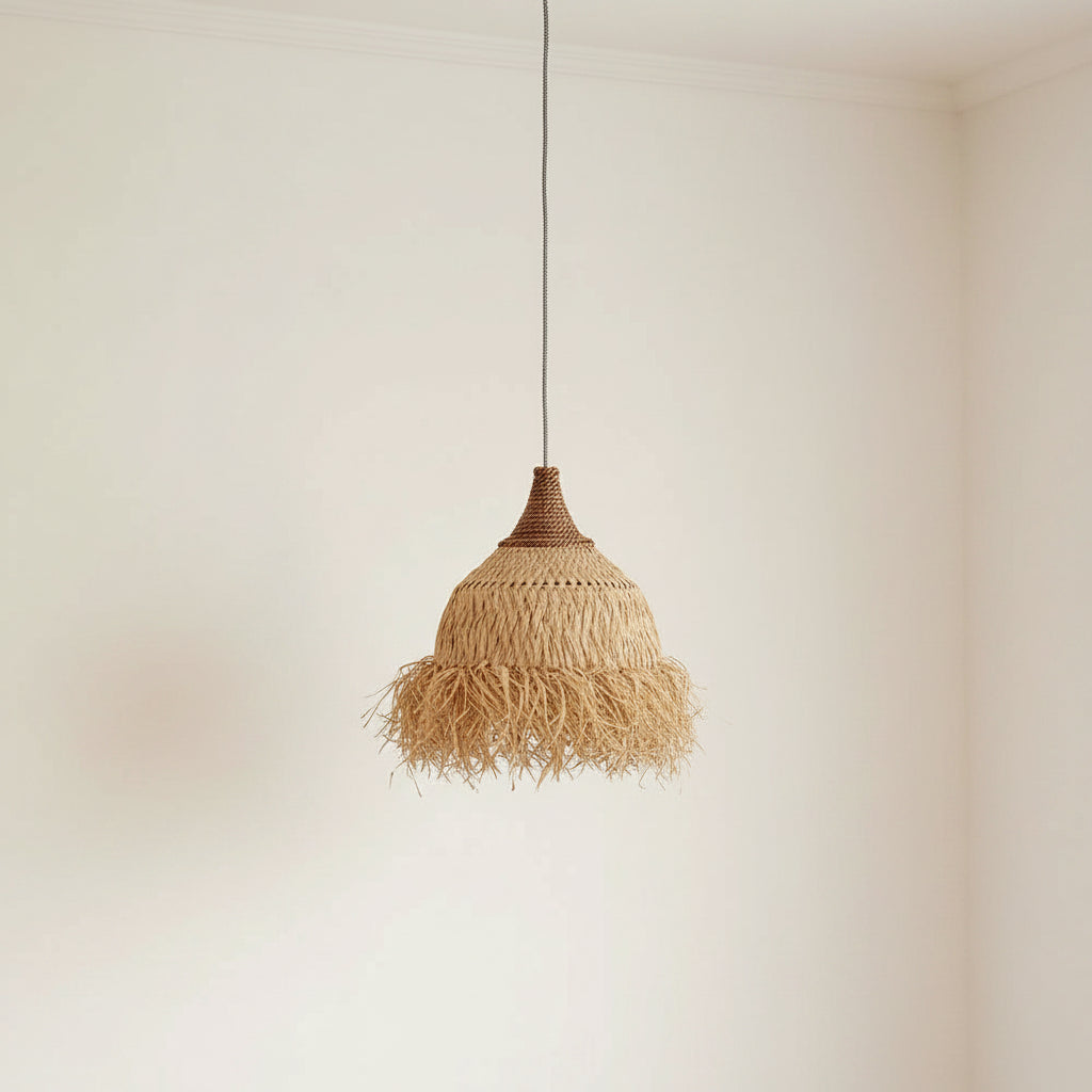 Woven pendant light hanging against a beige wall with wooden furniture.