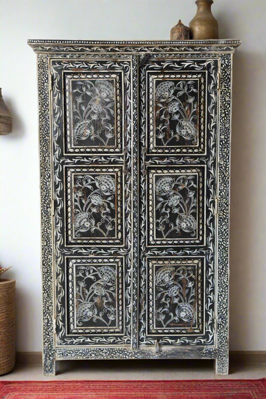  Its rich dark finish and detailed design make it an eye-catching accent for any entryway, living room, or bedroom.