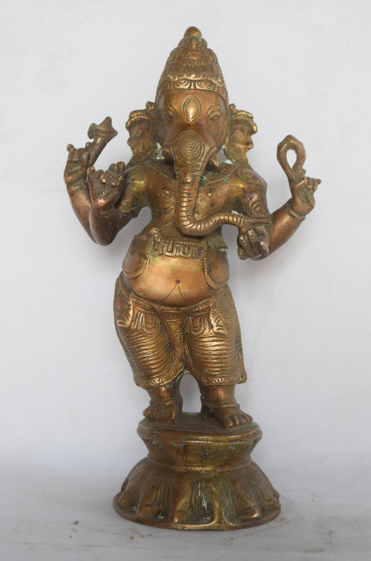 His four arms carry divine symbols of guidance and strength, while his tender expression brings a sense of peace and purity to any space.