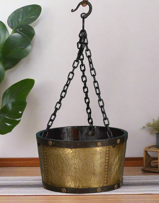 Elevate your indoor or outdoor décor with the Brasswood Hanging Planter, a stunning blend of vintage charm and handcrafted elegance. 