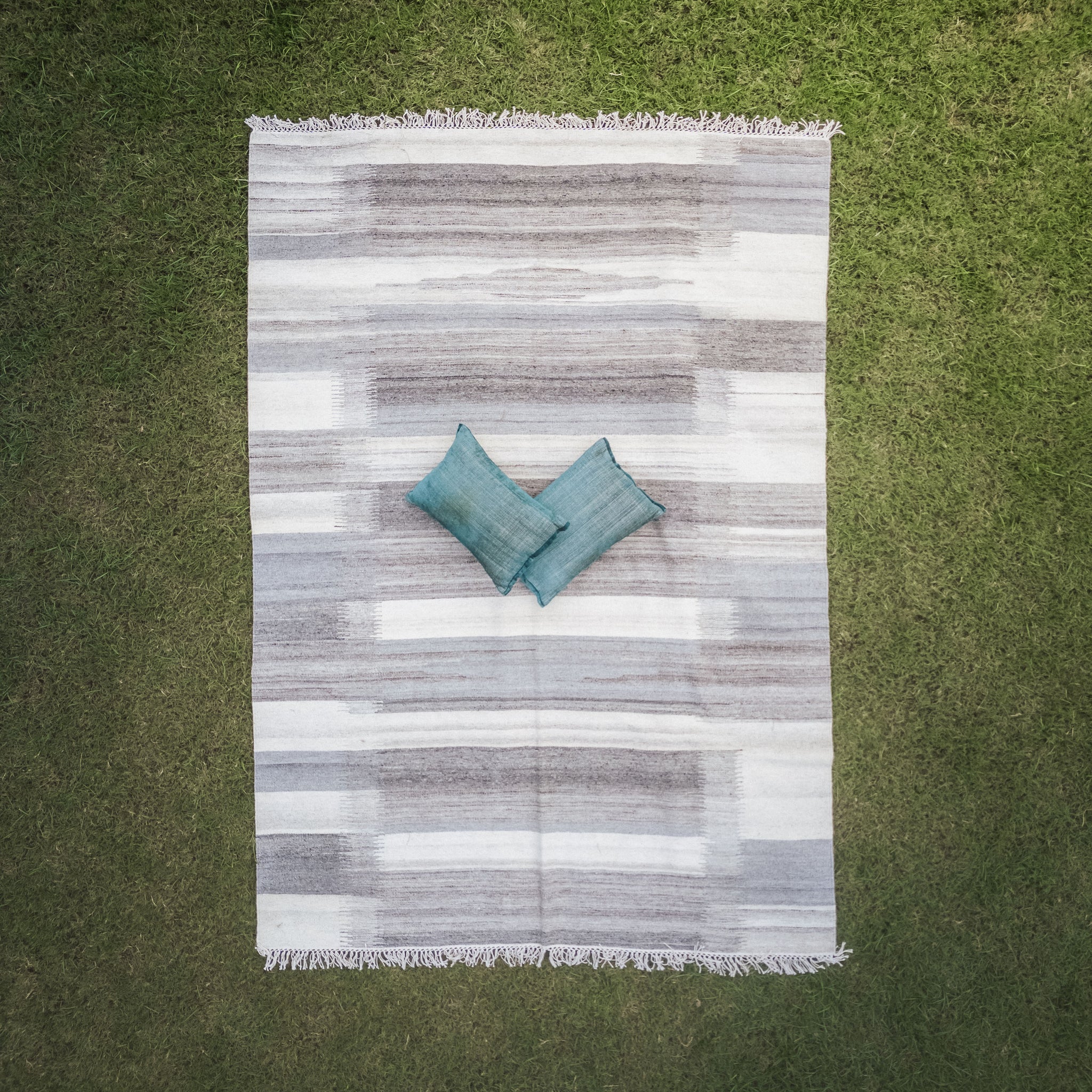 Calm Stripes Rug
Subtle sophistication rug
Natural charm decor
Soft gray and white tones
Peaceful home accents
Indoor serenity rug
Outdoor relaxation rug
Balanced design rug
Cozy environment decor
Soft texture rugs
Modern living decor
Effortless style rug
Comfort-focused home accessory
Tranquil area rug
Elegant floor covering
Minimalist design rug
Contemporary rug for relaxation
Versatile indoor outdoor use
Stylish comfort rug