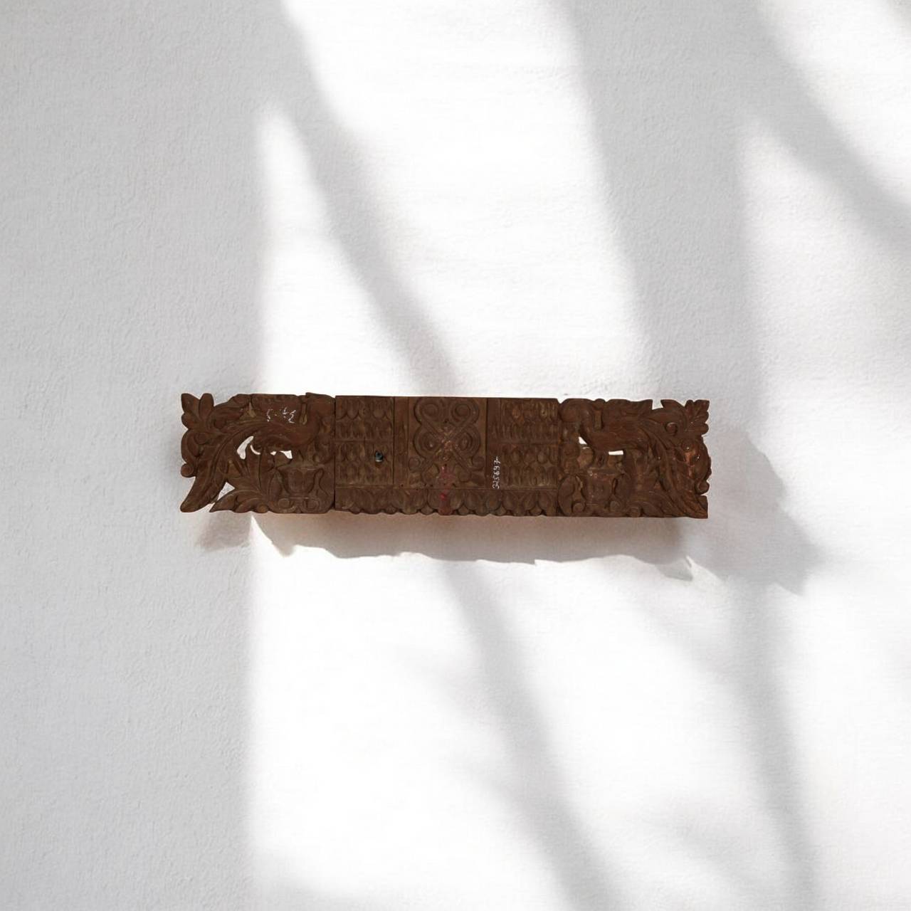 The natural imperfections and rich grain of the recycled wood lend unique character, making every panel one of a kind.