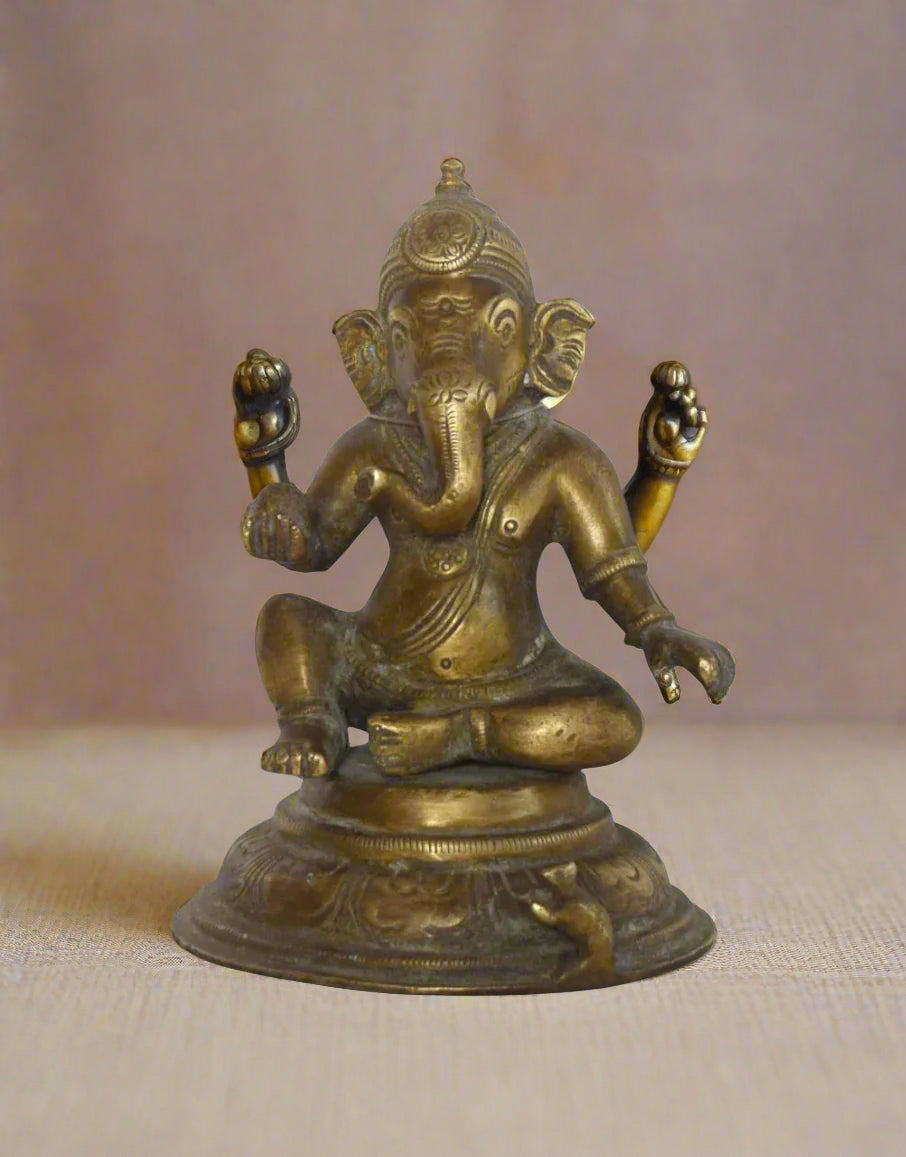 Invoke the presence of divine consciousness into your home or sacred space with this exquisitely crafted brass idol of Lord Ganesha, known here as Chaitanya Vinayaka. 