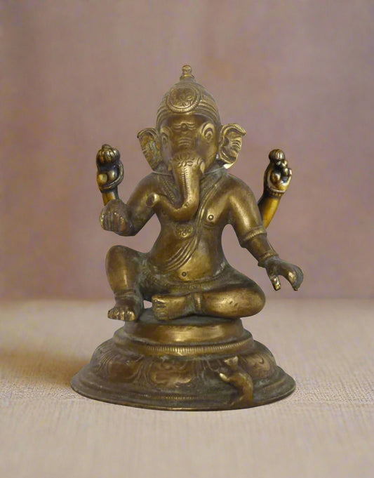 Invoke the presence of divine consciousness into your home or sacred space with this exquisitely crafted brass idol of Lord Ganesha, known here as Chaitanya Vinayaka. 