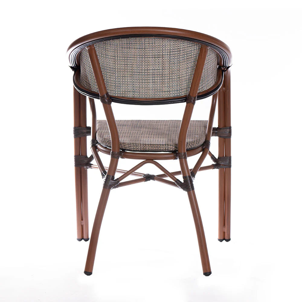 The Classic Woven Bistro Chair is a charming, timeless piece that brings a touch of vintage elegance and casual comfort to any setting. 