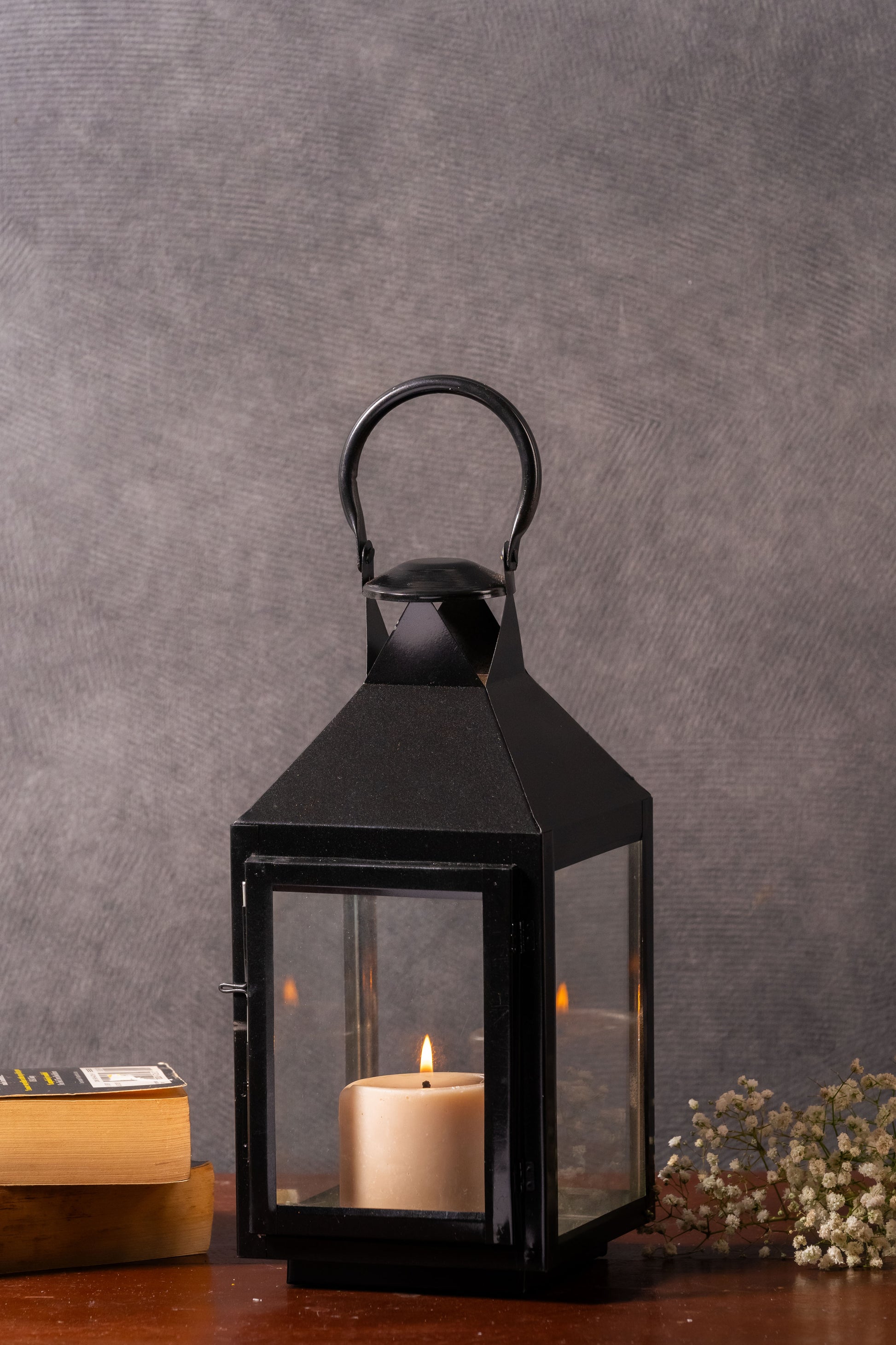 black metal lanterns
old-world elegance decor
indoor outdoor lanterns
cozy atmosphere lighting
sturdy lantern design
clear glass panel lanterns
rustic home decor
timeless lantern style
versatile lighting solutions
refined outdoor decor
decorative lantern set
stylish home accents
special occasion lighting
sleek black finish lanterns
charming lanterns for home