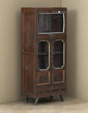 Elevate your interiors with the Classic Teak Display Cabinet, a timeless piece handcrafted from durable teak wood and fitted with glass panels for elegant display.