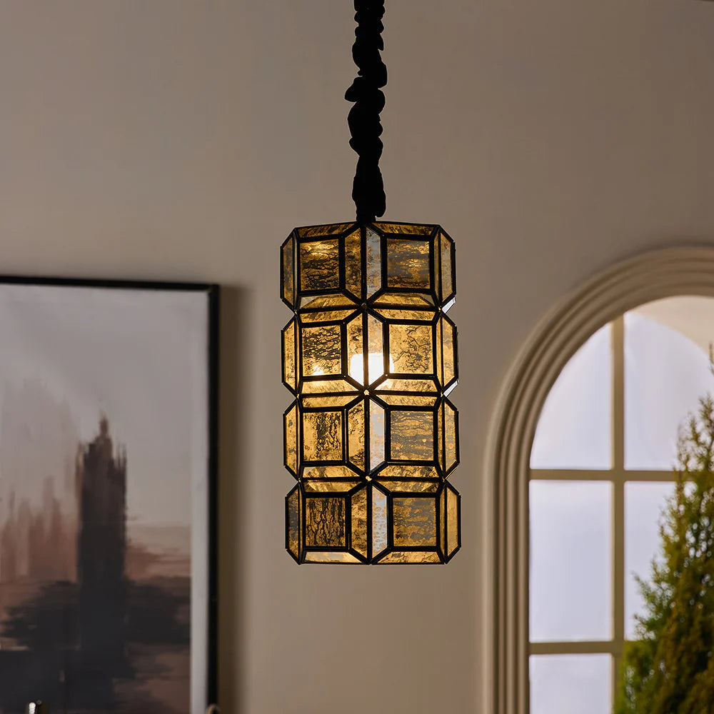 The Cubelle Glass Lamp is a celebration of structured elegance. 
