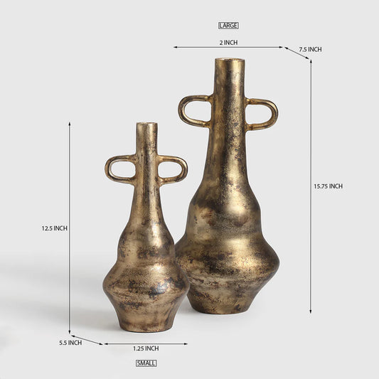 Crafted in aluminium with a rich, antique gold finish, these sculptural vases evoke the grandeur of classical forms reimagined for contemporary interiors.