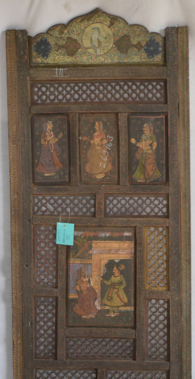 Intricately carved jali (lattice) patterns showcase traditional Indian design motifs, often seen in Mughal and Rajasthani architecture.