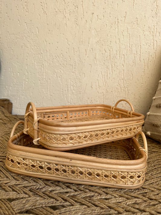 This lovely rattan tray is a must have to create stylish spaces. In effortlessly chic hand-woven cane with detailed wicker pattern makes it an eye catcher. This multipurpose tray look gorgeous on a coffee table with plants and candles , storage for blankets in living room or place them in bathroom with rolled up towels to merge functionality with stylish charm. TESU