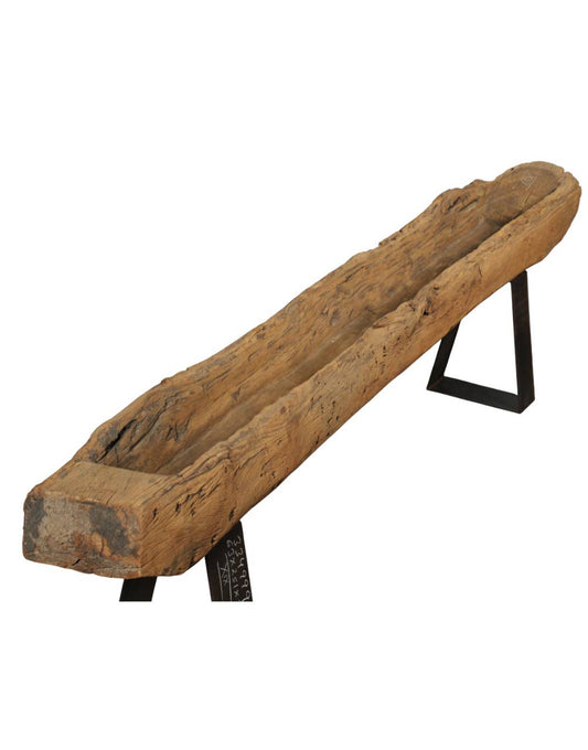 The Earth Frame Planter brings the outside in — sculpted from reclaimed wood and balanced on a bold iron frame. 