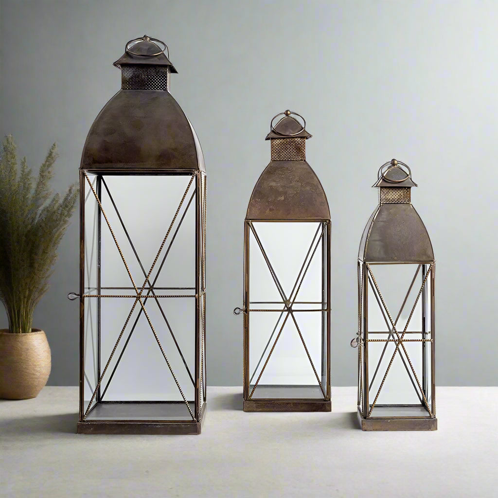 The Ember Lantern Set of 3is a beautiful antique lantern. Lanterns are a great way to add warmth and ambiance to a space, and they come in various styles to suit different decor themes