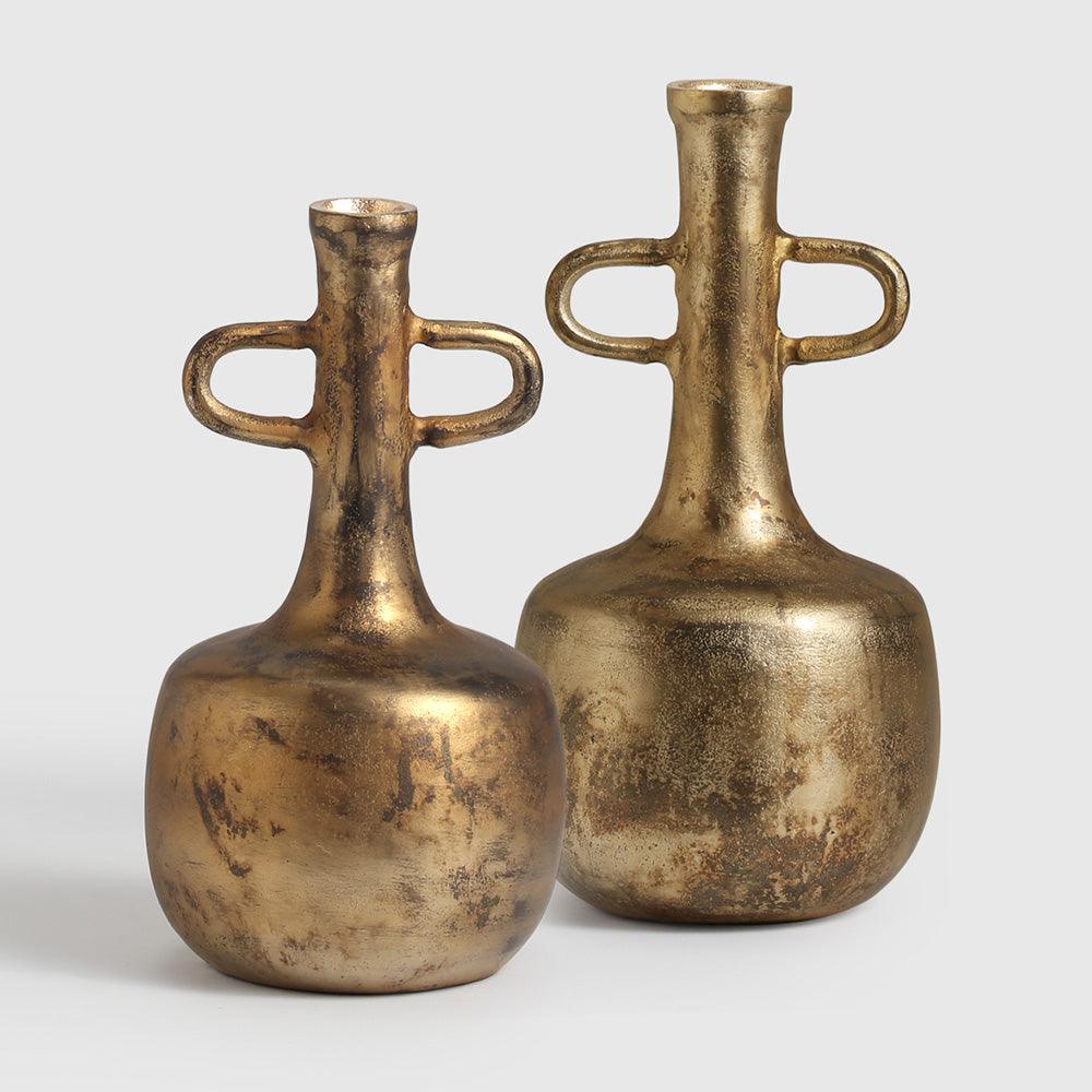 Bring the warmth of antiquity into your space with the Etruscan Echo Set, a striking duo of aluminum vases inspired by the refined forms of ancient Etruscan pottery. 