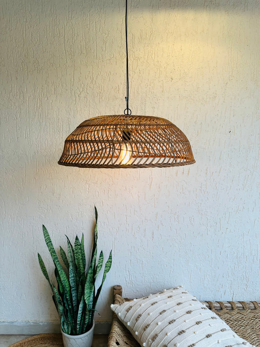 Handcrafted rattan pendant light adds bohemian charm to any space. Versatile design suits bedrooms, living areas, or covered patios. Expertly crafted for quality, adaptable to various ceiling heights. Each piece intricately woven by artisans, perfect for coastal, boho, or rustic decor. tesu