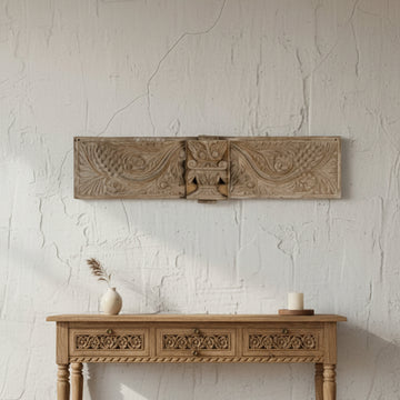 The Floral Revival Panel is a stunning blend of sustainability and timeless artistry. Featuring intricate floral carvings and a weathered finish, this piece embodies vintage charm while celebrating eco-friendly craftsmanship.