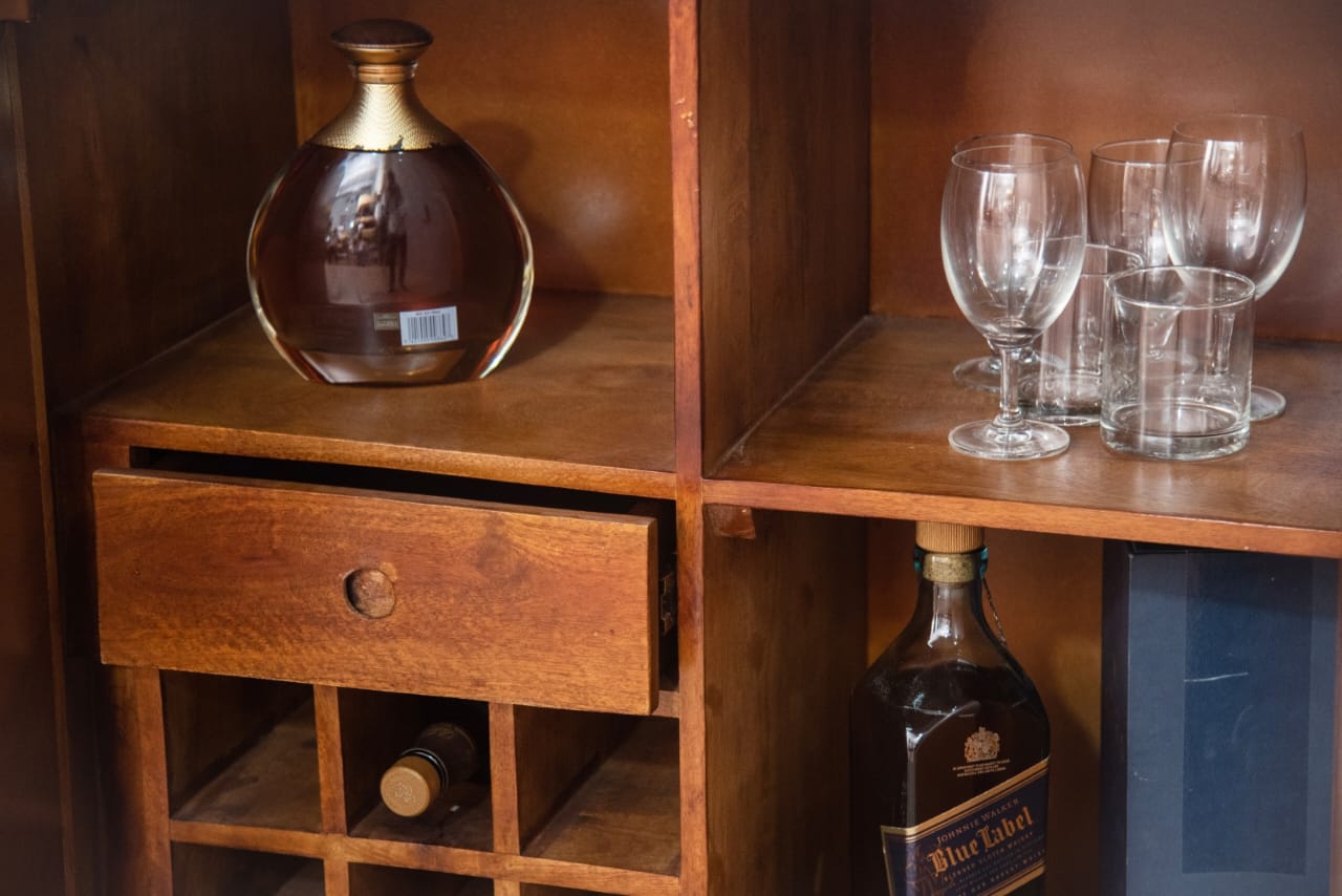 Dedicated wine rack holds up to 9 bottles, keeping them organized and accessible.