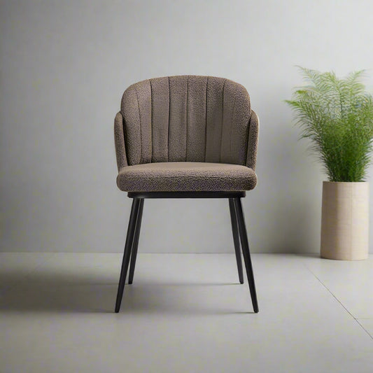 Grey Elegance Chair. Designed with sleek lines and a refined grey tone, this chair effortlessly blends contemporary style with comfort.