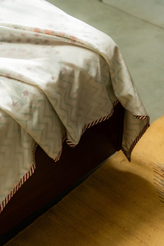 Our Gulnaar Dohar made of soft organic cotton is hand block printed with cheerful motifs. 